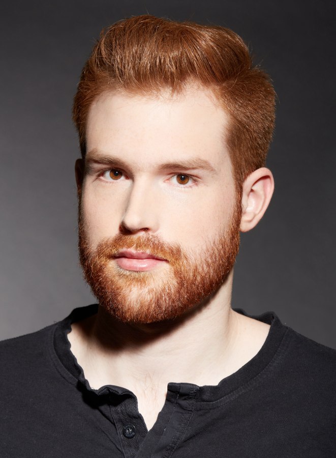 Contemporary short haircut for a male redhead