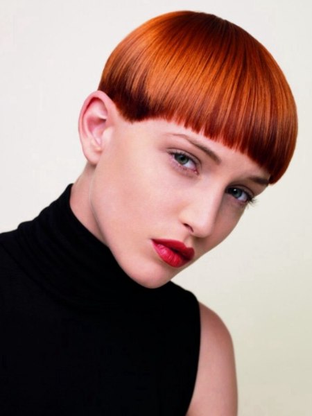 Short red hair and a black turtleneck