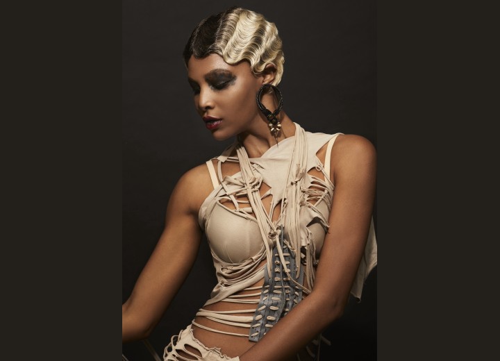 Black woman with short blonde hair and finger waves