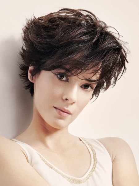 Pixie cut with longer hair in the neck