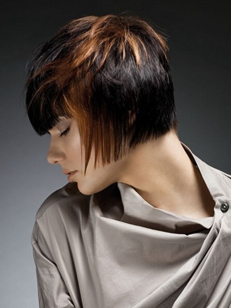 Short haircut with straight bangs and a straight cutting line in the neck