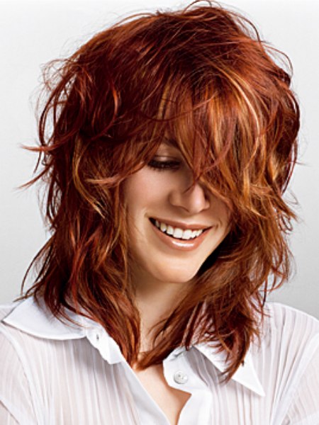 Fun shoulder-length style with layers for red hair