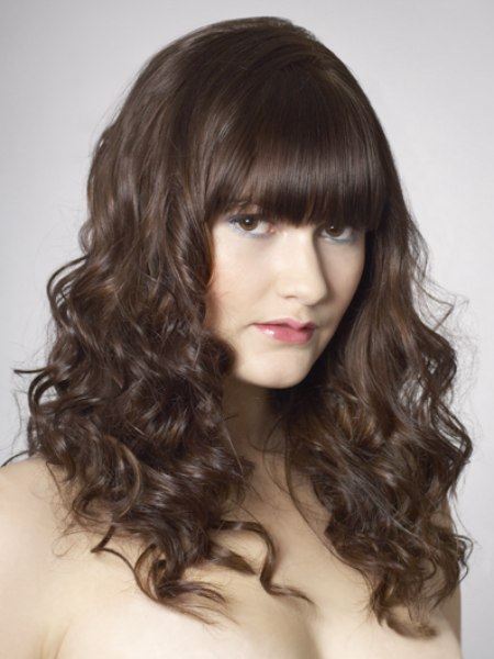 Hair with spiral curls and straight bangs