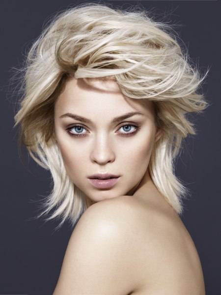 Blonde medium length hair with layers