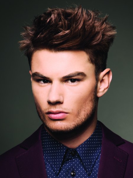 Men's haircut with longer top hair and spikes