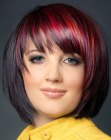 Cherry red hair cut into a bob with soft layers
