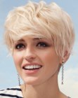 Easy to wear pixie haircut with volume in the crown