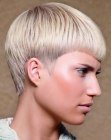 Daring short haircut with pointy sideburns for women