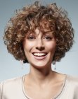 Short hair with small curls and a round shape