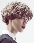 Short hairstyle with a wedge shape for natural curls