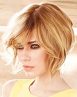 Short angled bob with volume and a lot of movement