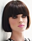 Classic short bob with sharp edges and a rounded fringe