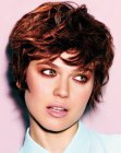 Charming short hairstyle with layers and finger tousling