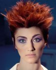 Red hair with high styling into long spikes