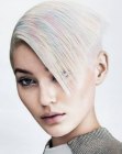 Sleek hair with undercut sides and color accents