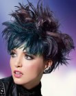 Short hairstyle with lifted spikes and a combination of purple and blue