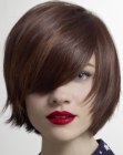 Contemporary short hairstyle with overlapping layers of brown hair