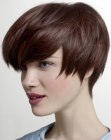 Pixie cut with volume in the crown and narrow sides
