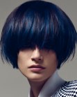Black hair with intense blue streaks cut into a round style