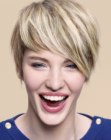 Long-fringed pixie cut with a wispy and feminine hairline