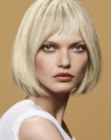 Short and easy to style razor-thinned bob with short bangs