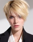Blonde pixie haircut with a bare neck section