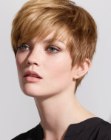 Feminine hairstyle with a short nape and more volume on top