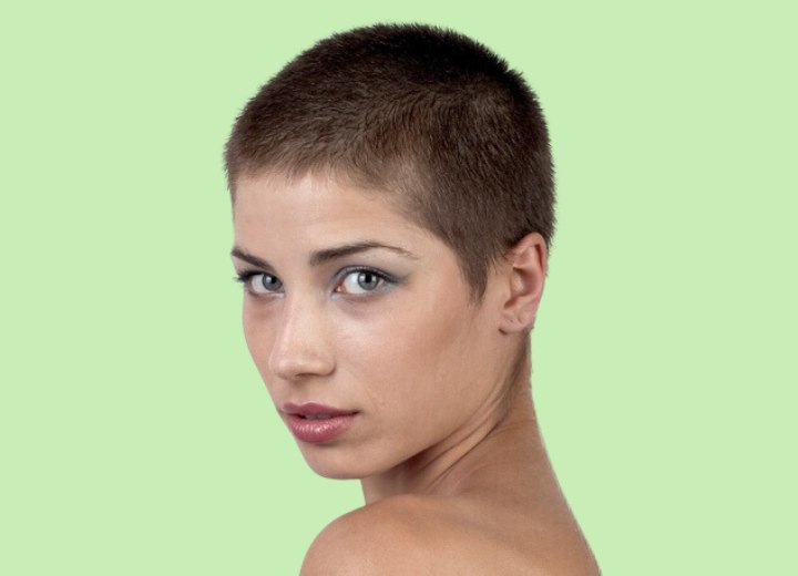 Woman with very short buzzed hair