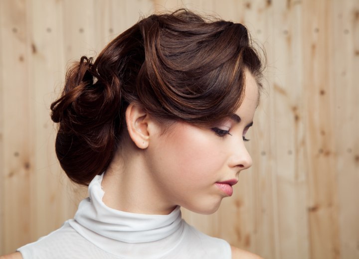 Brunette hair styled in a French chignon