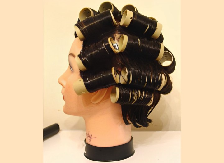 Chin length bob hair wrapped on rollers