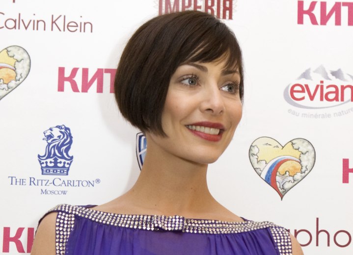 Natalie Imbruglia wearing her hair in a very short bob with bangs