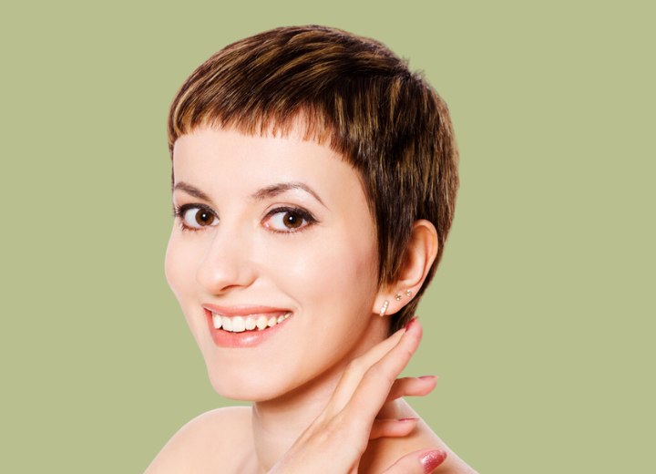 Woman with short hair and very short bangs