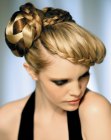 Hairstyle with a braided knot