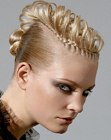 Updo with sleek sides and a curled crown
