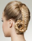 Updo with blonde woven hair