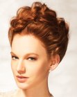 Soft updo with the hair pinned to the crown