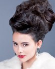 High updo with curls and a beehive shape