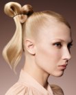 Hairstyle with a folded high ponytail