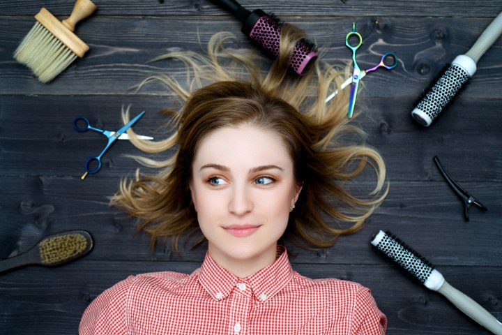 Girl considering how to do her hair