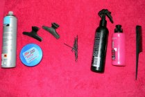 Tools and hair products to create a faux pixie