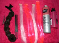 Tools and hair products to create a sock bun with extensions