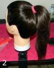 Sock bun - Pull the hair into a neat ponytail