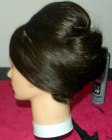 Sophisticated chignon on a training head