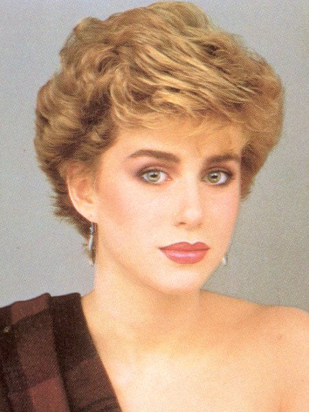 Short 1980s hairstyle with volume and height