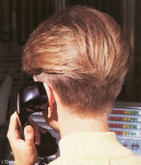 Nape view of a short 1980s hairstyle