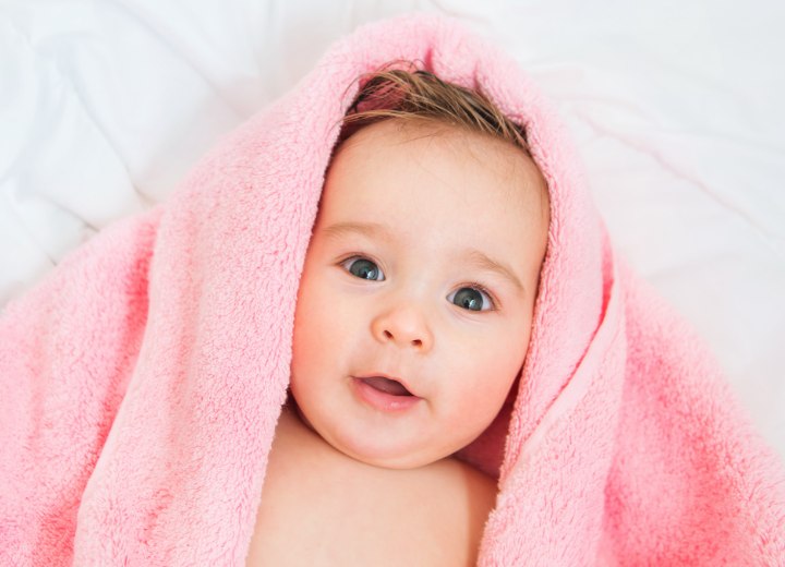 Towel drying a baby's hair