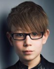 Modern haircut for boys with glasses