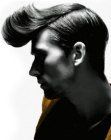 Guys hairstyle with a flipped-up forelock