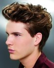 Short hairstyle with lifted top hair for boys