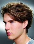 Hair with a flipped back fringe for guys